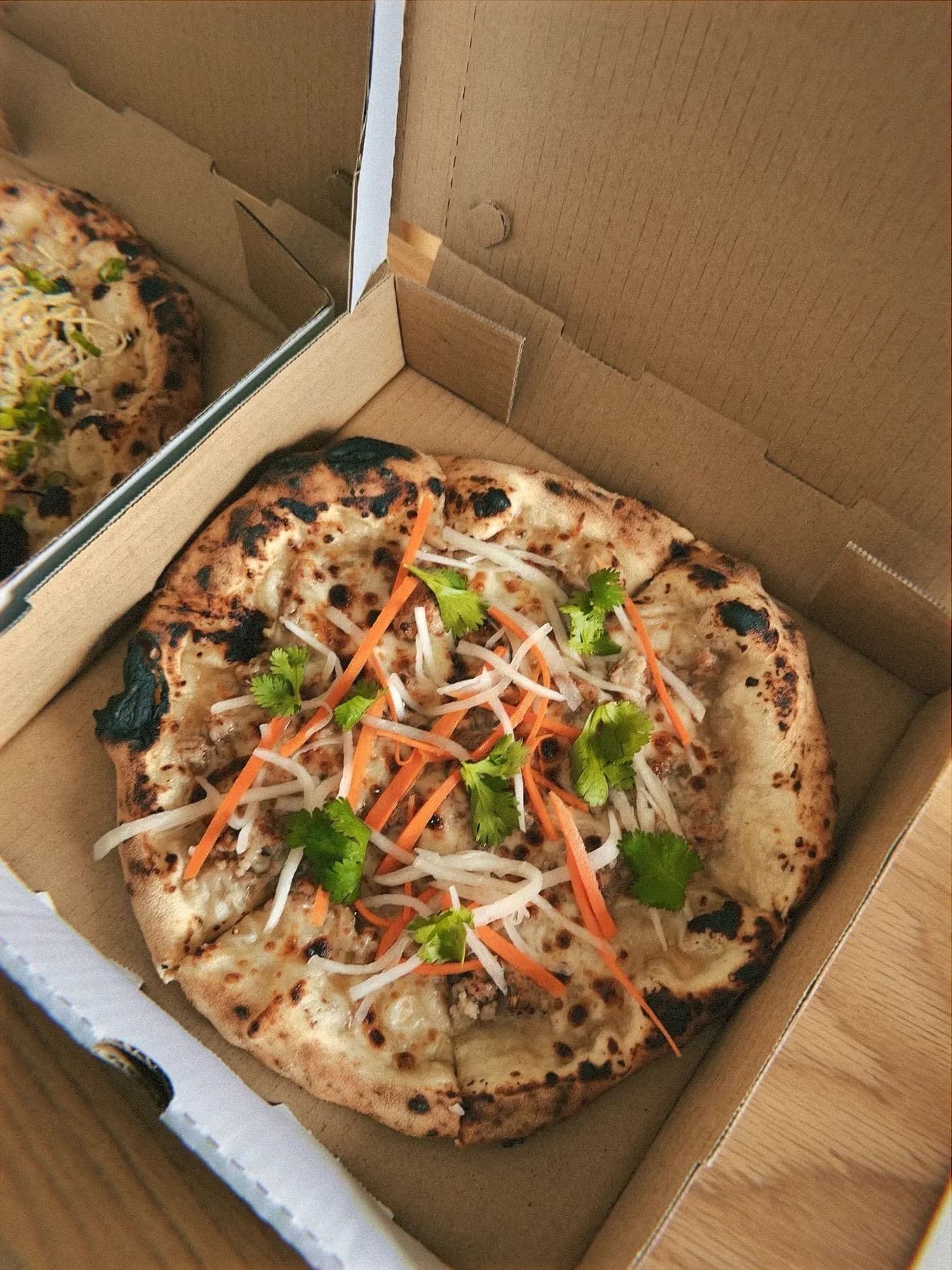 fusion pizzas in boxes